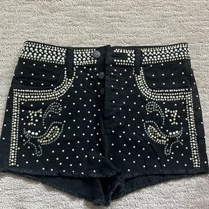 Black all round studded shorts